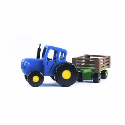 игрушка большой синий трактор из мультика с телегой